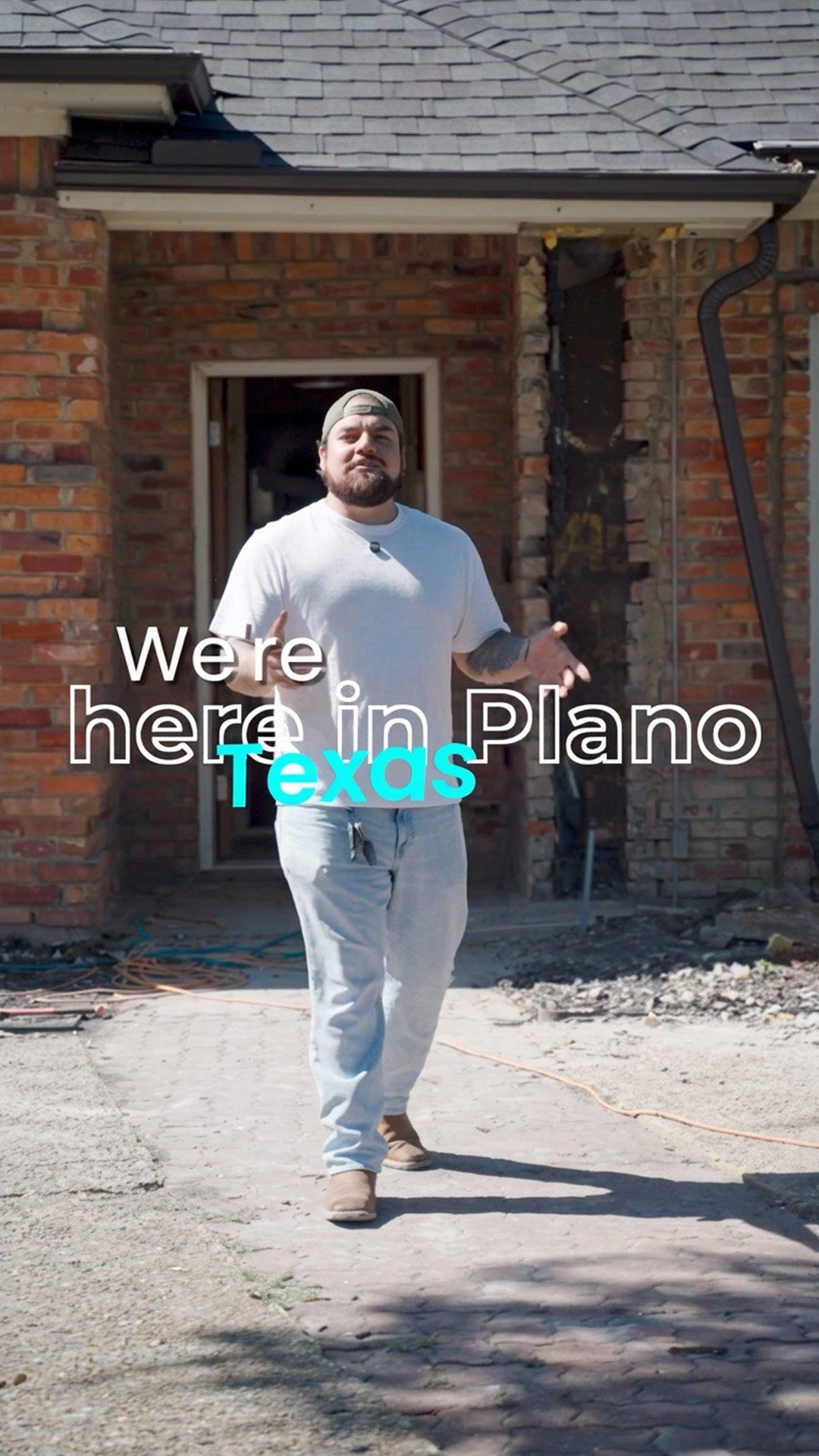 Bearded man walks before a damaged brick house with overlaid text reading “We’re here in Plano Texas.”
